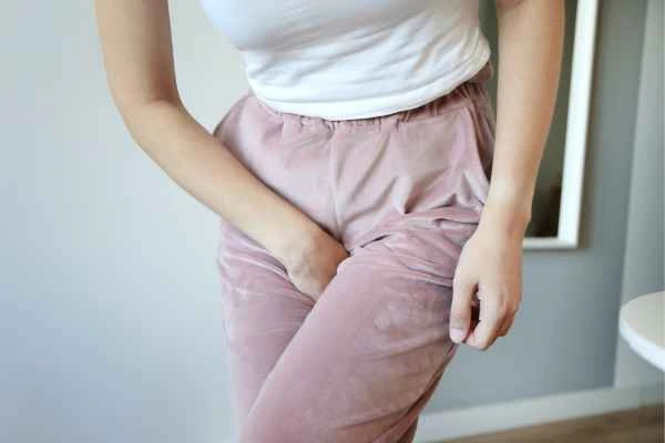 woman running for the toilet because of urinary incontinence Runcorn